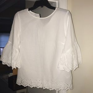 H&M blouse with eyelet trim and bell sleeves